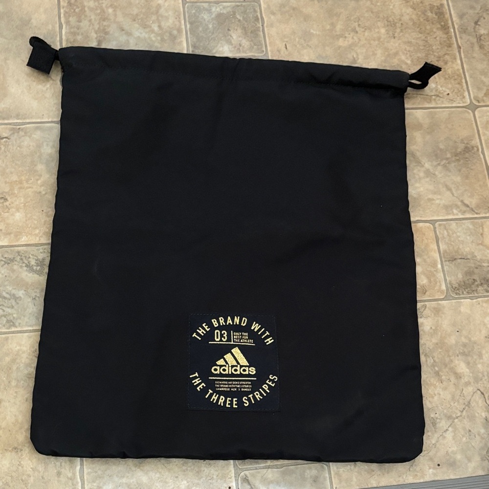 Adidas Black Duffel Bag with Gold Logo